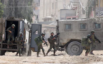 Israeli soldiers operate during a raid in the Nur Shams camp for Palestinian refugees near the city of Tulkarem